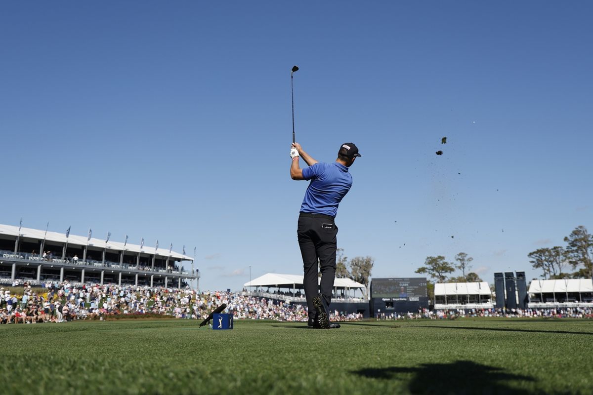 Mar 13, 2025; Ponte Vedra Beach, Florida, USA; Wyndham Clark hits off of the tee on seventeen during the first round of The Players Championship golf tournament at TPC Sawgrass. Mandatory Credit: Jeff Swinger-Imagn Images