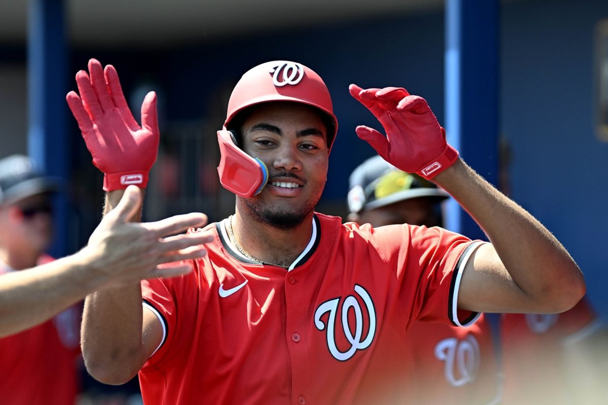 Mar 13, 2025; Port Charlotte, Florida, USA; Washington Nationals designated hitter James Wood (29) celebrates with his teammates after hitting a three run home run in the first inning against the Tampa Bays Rays during spring training at Charlotte Sports Park. Mandatory Credit: Jonathan Dyer-Imagn Images