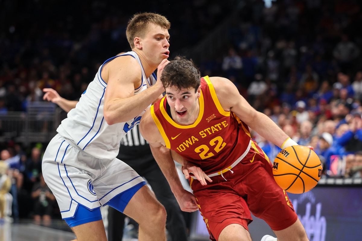 Mar 13, 2025; Kansas City, MO, USA; Iowa State Cyclones forward Milan Momcilovic (22) drives to the basket during the second half against the Brigham Young Cougars at T-Mobile Center. Mandatory Credit: William Purnell-Imagn Images