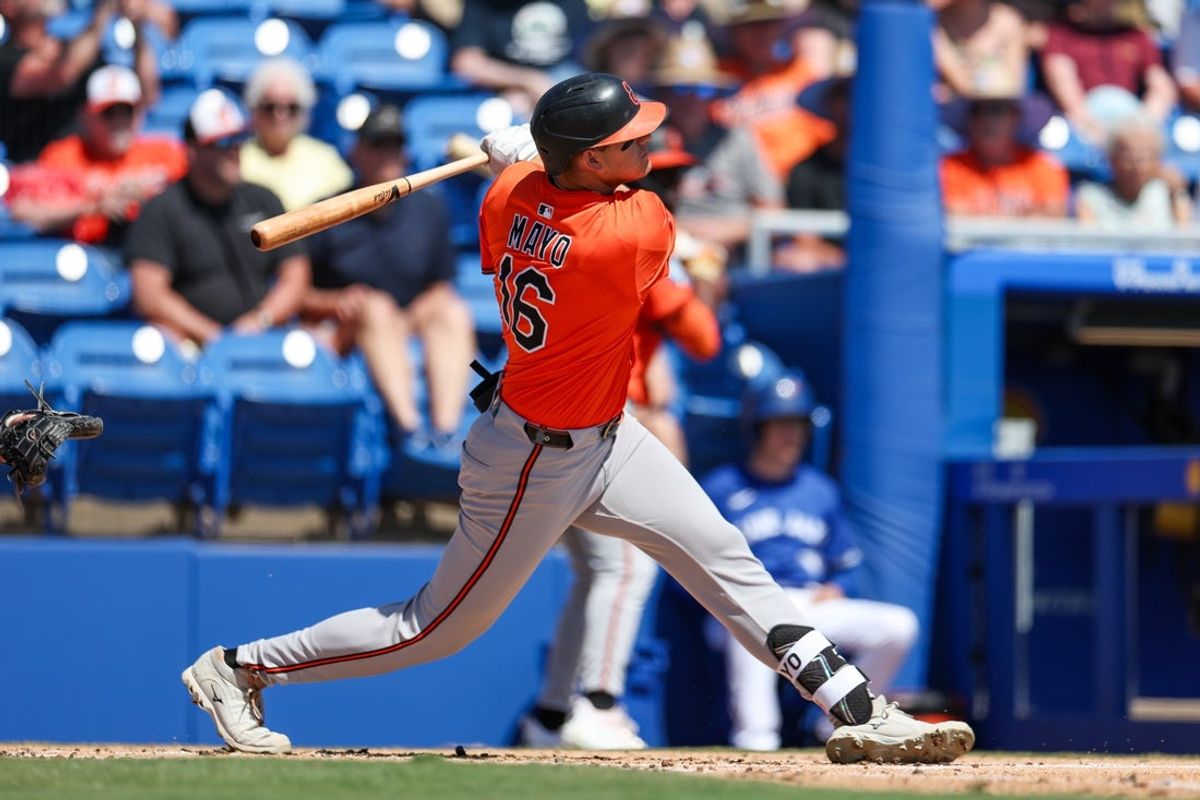 Mar 13, 2025; Dunedin, Florida, USA; Baltimore Orioles third baseman Coby Mayo (16) doubles against the Toronto Blue Jays in the second inning during spring training at TD Ballpark. Mandatory Credit: Nathan Ray Seebeck-Imagn Images