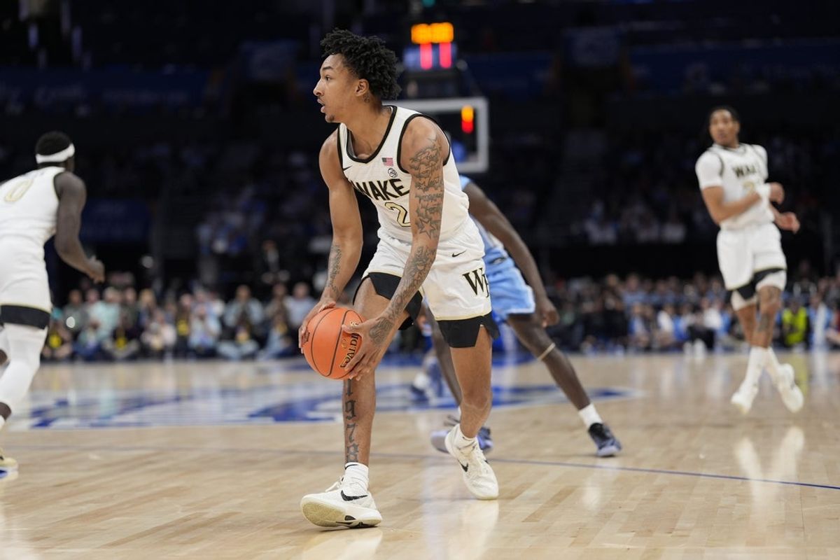Mar 13, 2025; Charlotte, NC, USA; Wake Forest Demon Deacons guard Juke Harris (2) handles the ball against the North Carolina Tar Heels during the first half at Spectrum Center. Mandatory Credit: Jim Dedmon-Imagn Images