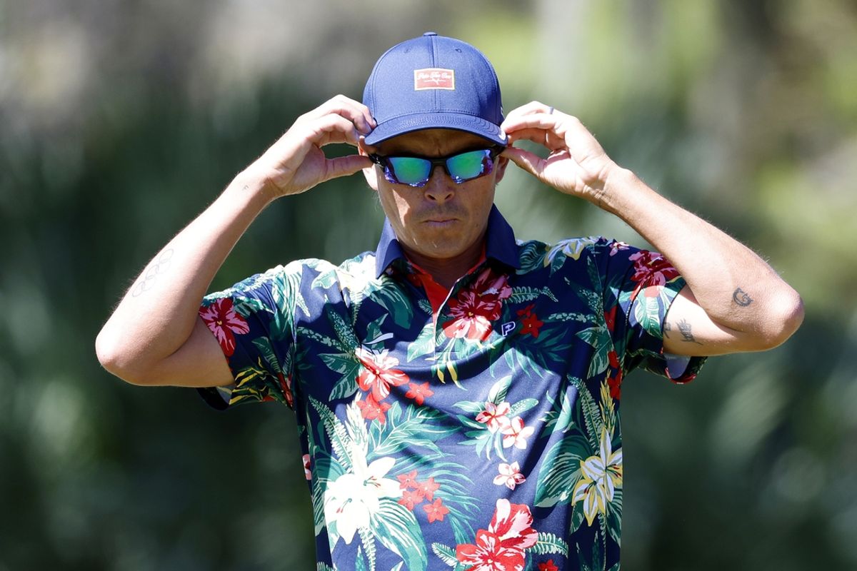 Mar 13, 2025; Ponte Vedra Beach, Florida, USA; Rickie Fowler adjust before putting on the fifth green during the first round of The Players Championship golf tournament at TPC Sawgrass. Mandatory Credit: Jeff Swinger-Imagn Images