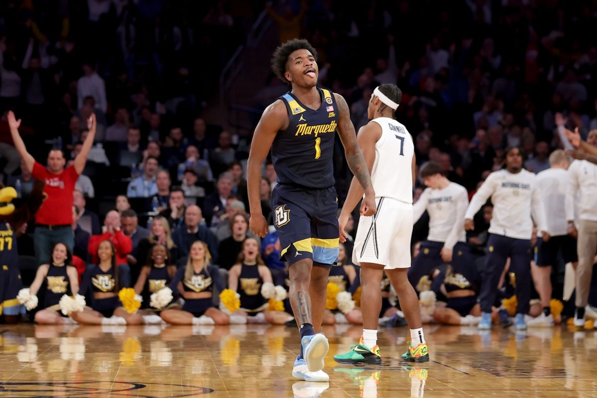 Marquette Golden Eagles guard Kam Jones (1) celebrates his three point shot against Xavier Musketeers guard Ryan Conwell (7) during the second half at Madison Square Garden. Mandatory Credit: Brad Penner-Imagn Images