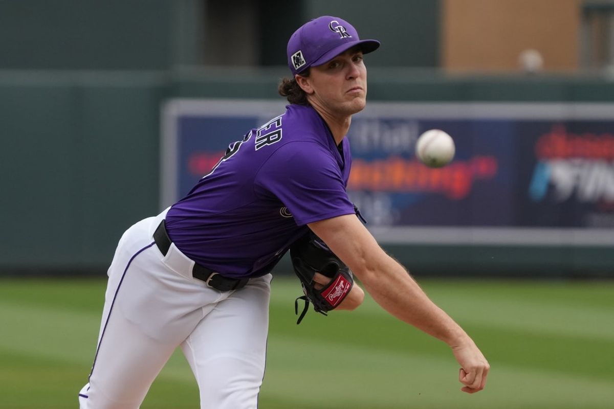 Mar 13, 2025; Salt River Pima-Maricopa, Arizona, USA; Colorado Rockies pitcher Chase Dollander throws against the Cleveland Guardians in the first inning at Salt River Fields at Talking Stick. Mandatory Credit: Rick Scuteri-Imagn Images