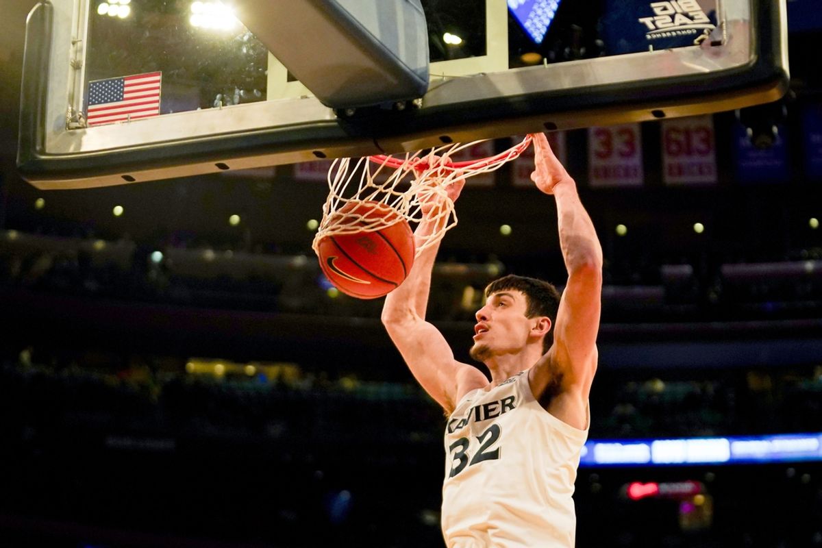 Xavier Musketeers forward Zach Freemantle (32) dunks the ball in the second half of the NCAA Big East Conference Tournament quarterfinals game between the Xavier Musketeers and Marquette Golden Eagles, Thursday, March 13, 2025, at Madison Square Garden in New York City. Golden Eagles won 89-87.