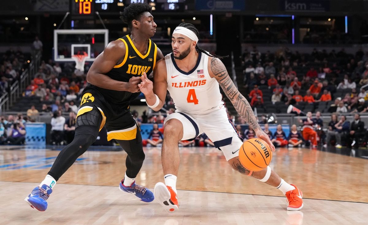 Iowa Hawkeyes guard Drew Thelwell (3) guards Illinois Fighting Illini guard Kylan Boswell (4) on Thursday, March 13, 2025, during the second round of the men's Big Ten tournament at Gainbridge Fieldhouse in Indianapolis.