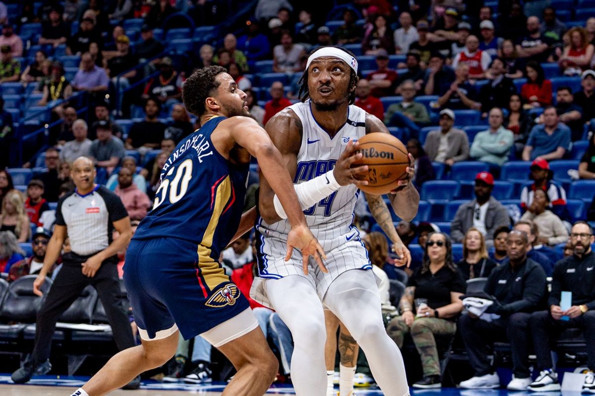Mar 13, 2025; New Orleans, Louisiana, USA;  New Orleans Pelicans forward Jeremiah Robinson-Earl (50) guards Orlando Magic center Wendell Carter Jr. (34) during the first half at Smoothie King Center. Mandatory Credit: Stephen Lew-Imagn Images