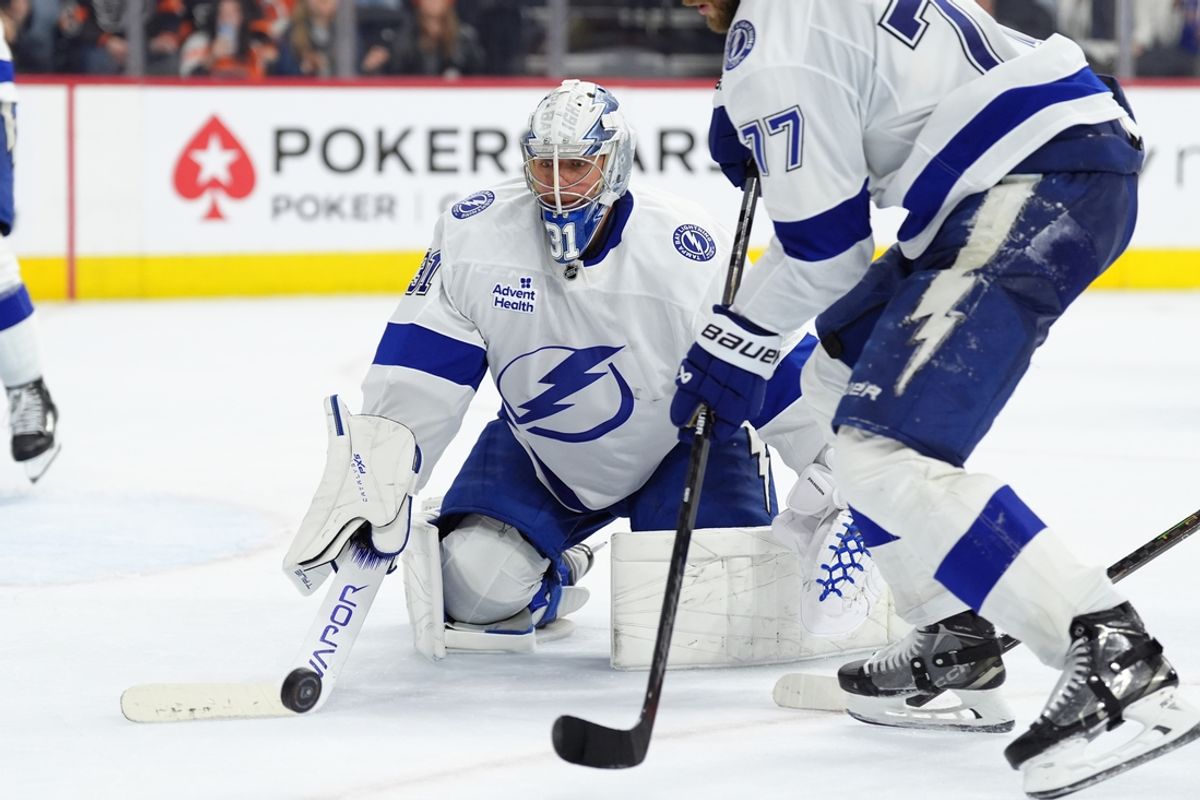 Mar 13, 2025; Philadelphia, Pennsylvania, USA; Tampa Bay Lightning goalie Jonas Johansson (31) pushes away the puck against the Philadelphia Flyers in overtime at Wells Fargo Center. Mandatory Credit: Kyle Ross-Imagn Images