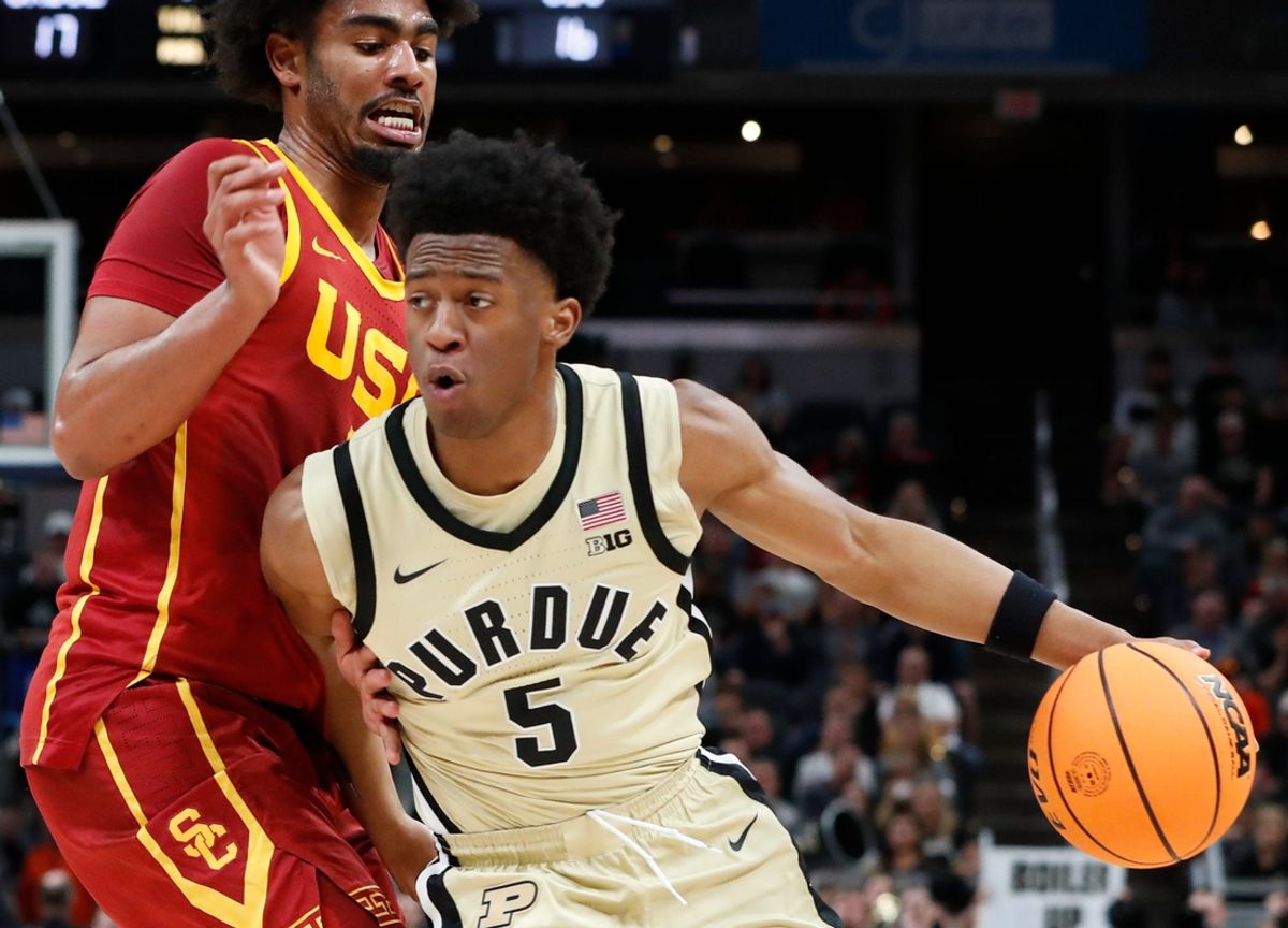 USC Trojans forward Saint Thomas (0) defends Purdue Boilermakers guard Myles Colvin (5) Thursday, March 13, 2025, during the Big Ten Men’s Basketball Tournament game at Gainbridge Fieldhouse in Indianapolis.