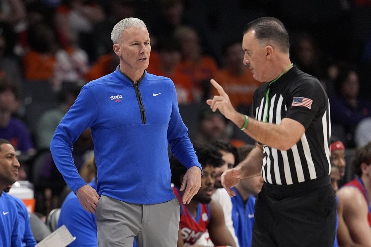 Mar 13, 2025; Charlotte, NC, USA; Southern Methodist Mustangs head coach Andy Enfield during the first half against the Clemson Tigers at Spectrum Center. Mandatory Credit: Jim Dedmon-Imagn Images