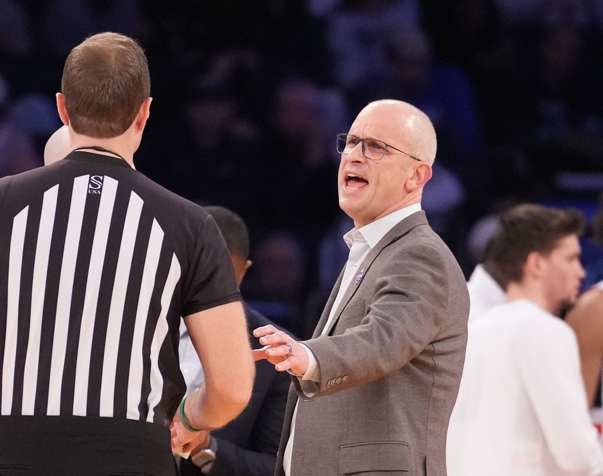 Mar 13, 2025; New York, NY, USA;  Connecticut Huskies head coach Dan Hurley talks to the referee during the first half at Madison Square Garden. He was assed a technical foul during that timeout. Mandatory Credit: Robert Deutsch-Imagn Images