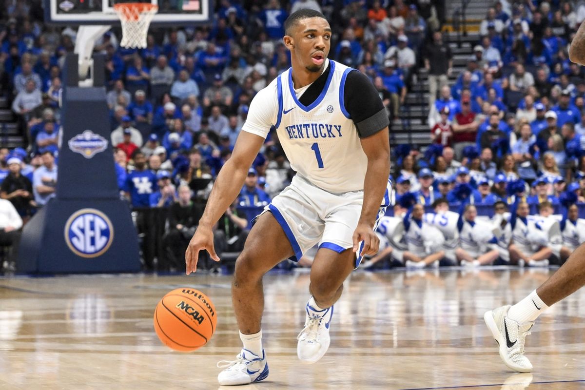 Mar 13, 2025; Nashville, TN, USA;  Kentucky Wildcats guard Lamont Butler (1) dribbles the ball against the Oklahoma Sooners during the first half at Bridgestone Arena. Mandatory Credit: Steve Roberts-Imagn Images