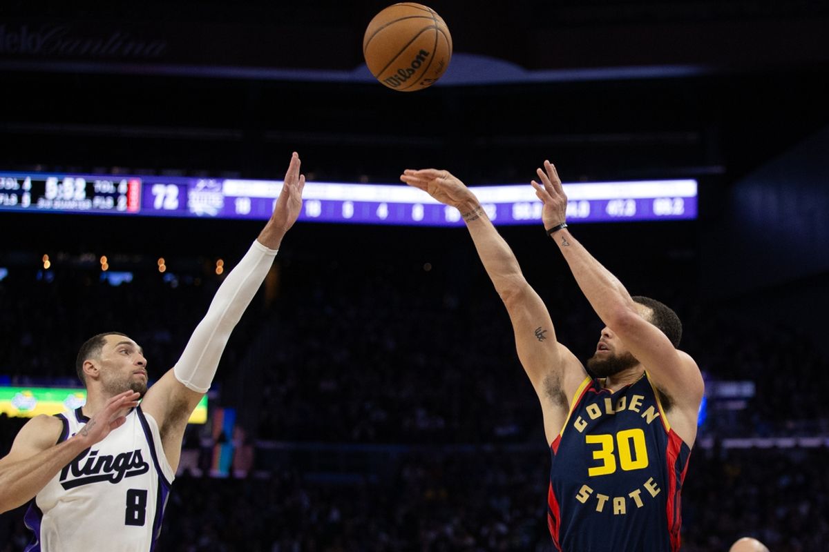 Mar 13, 2025; San Francisco, California, USA; Golden State Warriors guard Stephen Curry (30) shoots over Sacramento Kings guard Zach LaVine (8) during the third quarter at Chase Center. Mandatory Credit: D. Ross Cameron-Imagn Images