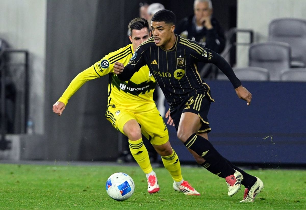 Mar 4, 2025; Los Angeles, California, USA;  Los Angeles FC midfielder Igor Jesus (6) controls the ball under pressure from Columbus Crew midfielder Dylan Chambost (7) during the first half at BMO Stadium. Mandatory Credit: Alex Gallardo-Imagn Images
