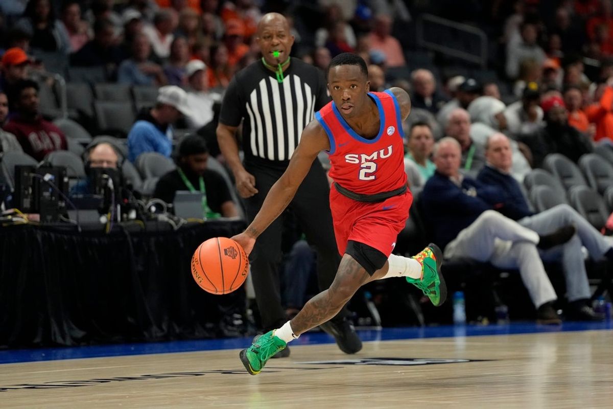 Mar 13, 2025; Charlotte, NC, USA; Southern Methodist Mustangs guard Boopie Miller (2) on the fast break in the second half at Spectrum Center. Mandatory Credit: Bob Donnan-Imagn Images
