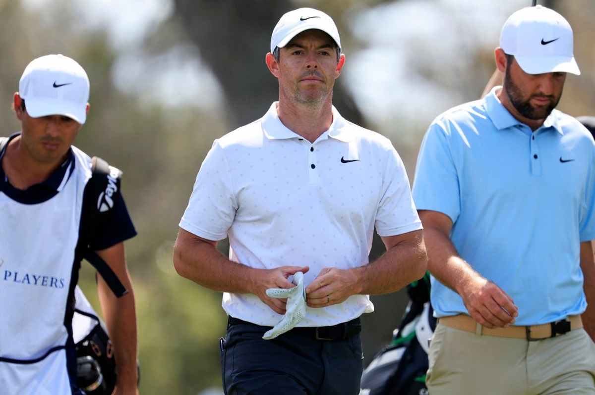 Rory McIlroy walks next to Scottie Scheffler on the ninth fairway during the second round of The Players Championship PGA golf tournment Friday, March 14, 2025 at TPC Sawgrass in Ponte Vedra Beach, Fla. [Corey Perrine/Florida Times-Union]