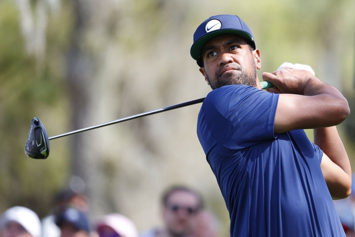 Mar 14, 2025; Ponte Vedra Beach, Florida, USA; Tony Finau hits from the ninth tee during the second round of The Players Championship golf tournament at TPC Sawgrass. Mandatory Credit: Jeff Swinger-Imagn Images
