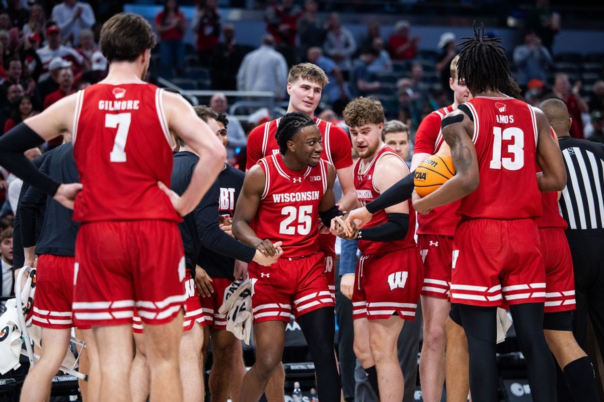 Mar 14, 2025; Indianapolis, IN, USA; Wisconsin Badgers guard John Blackwell (25) celebrates after a loose ball  in the second half against the UCLA Bruins at Gainbridge Fieldhouse. Mandatory Credit: Trevor Ruszkowski-Imagn Images