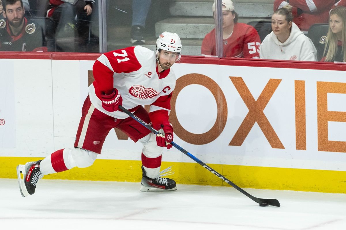 Mar 10, 2025; Ottawa, Ontario, CAN; Detroit Red Wings center Dylan Larkin (71) skates with the puck in the third period against the Ottawa Senators at the Canadian Tire Centre. Mandatory Credit: Marc DesRosiers-Imagn Images