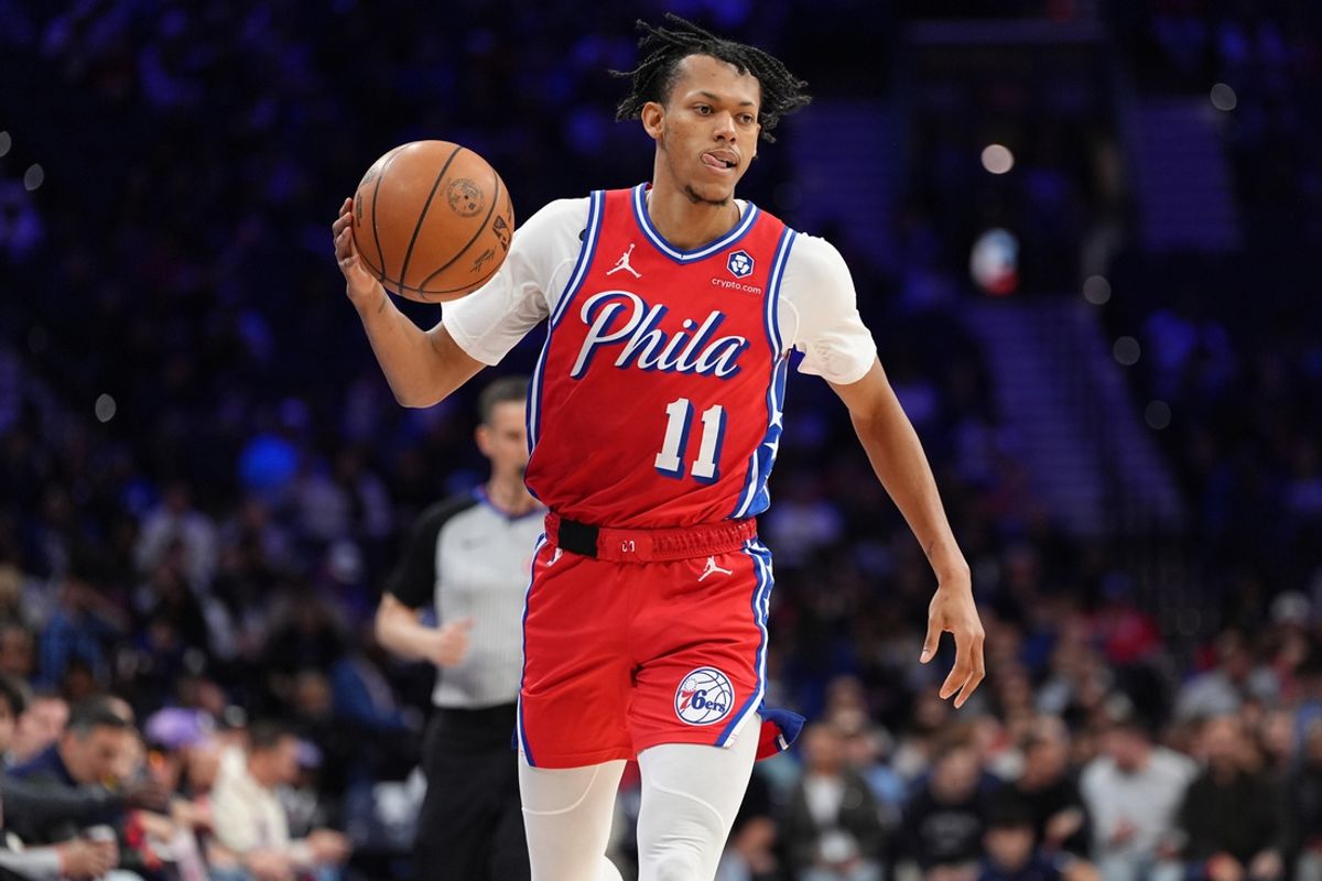 Mar 14, 2025; Philadelphia, Pennsylvania, USA; Philadelphia 76ers guard Jeff Dowtin Jr (11) controls the ball against the Indiana Pacers in the second quarter at Wells Fargo Center. Mandatory Credit: Kyle Ross-Imagn Images
