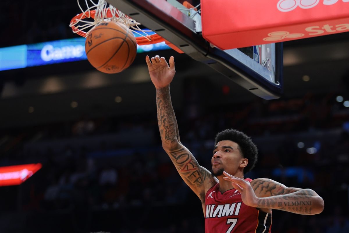 Mar 14, 2025; Miami, Florida, USA; Miami Heat center Kel'el Ware (7) dunks against the Boston Celtics during the first quarter at Kaseya Center. Mandatory Credit: Sam Navarro-Imagn Images