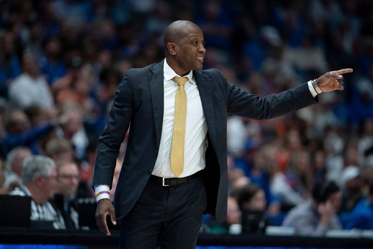 Missouri head coach Dennis Gates works the sideline against Florida during the first half of their quarterfinal game of the SEC Men's Basketball Tournament at Bridgestone Arena in Nashville, Tenn., Friday, March 14, 2025.