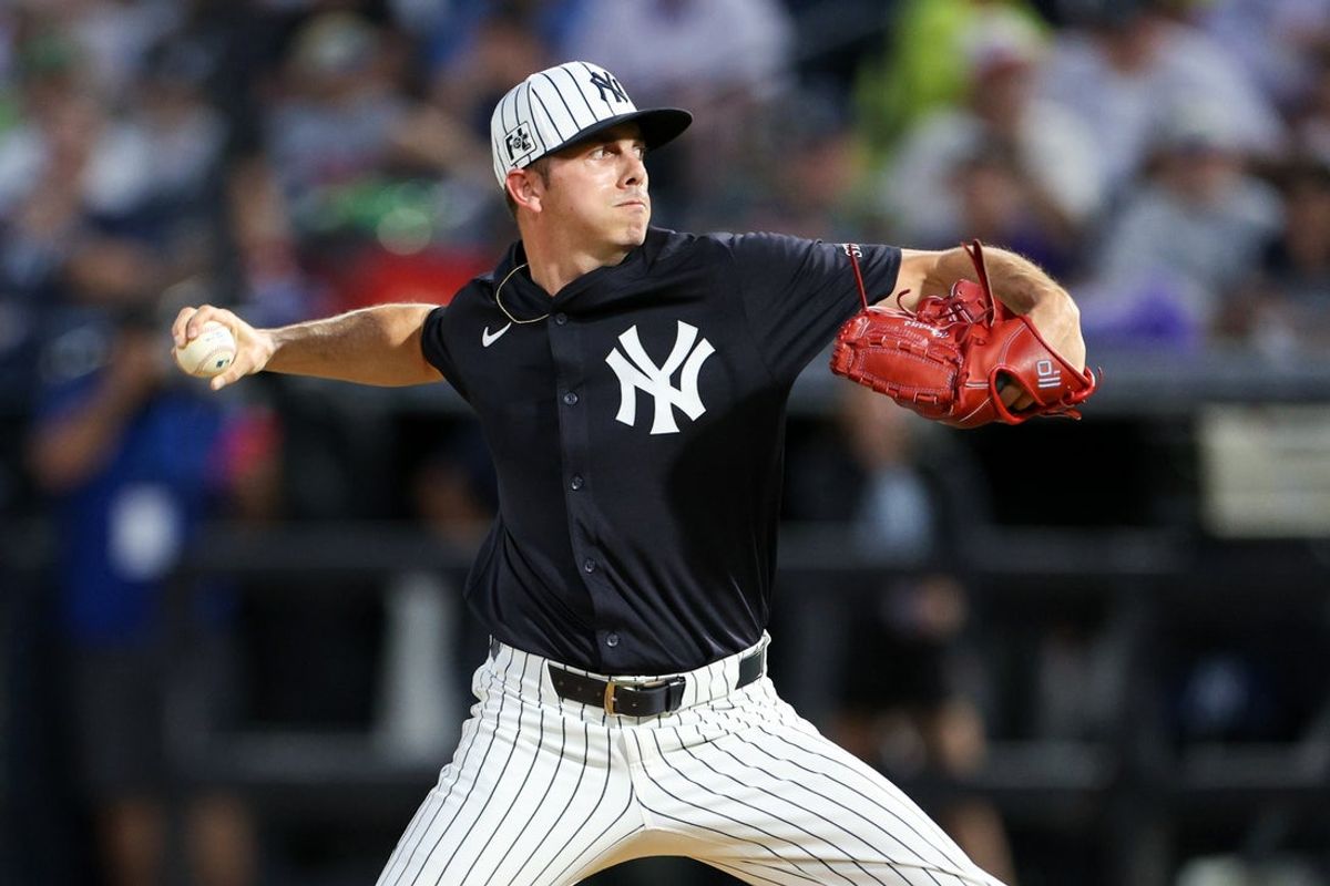 Mar 14, 2025; Tampa, Florida, USA; New York Yankees pitcher Allan Winans  (62) throws a pitch against the Philadelphia Phillies in the fifth inning during spring training at George M. Steinbrenner Field. Mandatory Credit: Nathan Ray Seebeck-Imagn Images