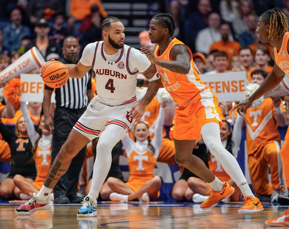 Tennessee forward Felix Okpara (34) guards Auburn forward Johni Broome (4) during the first half of a Southeastern Conference tournament semifinal game at Bridgestone Arena in Nashville, Tenn., Saturday, March 15, 2025.