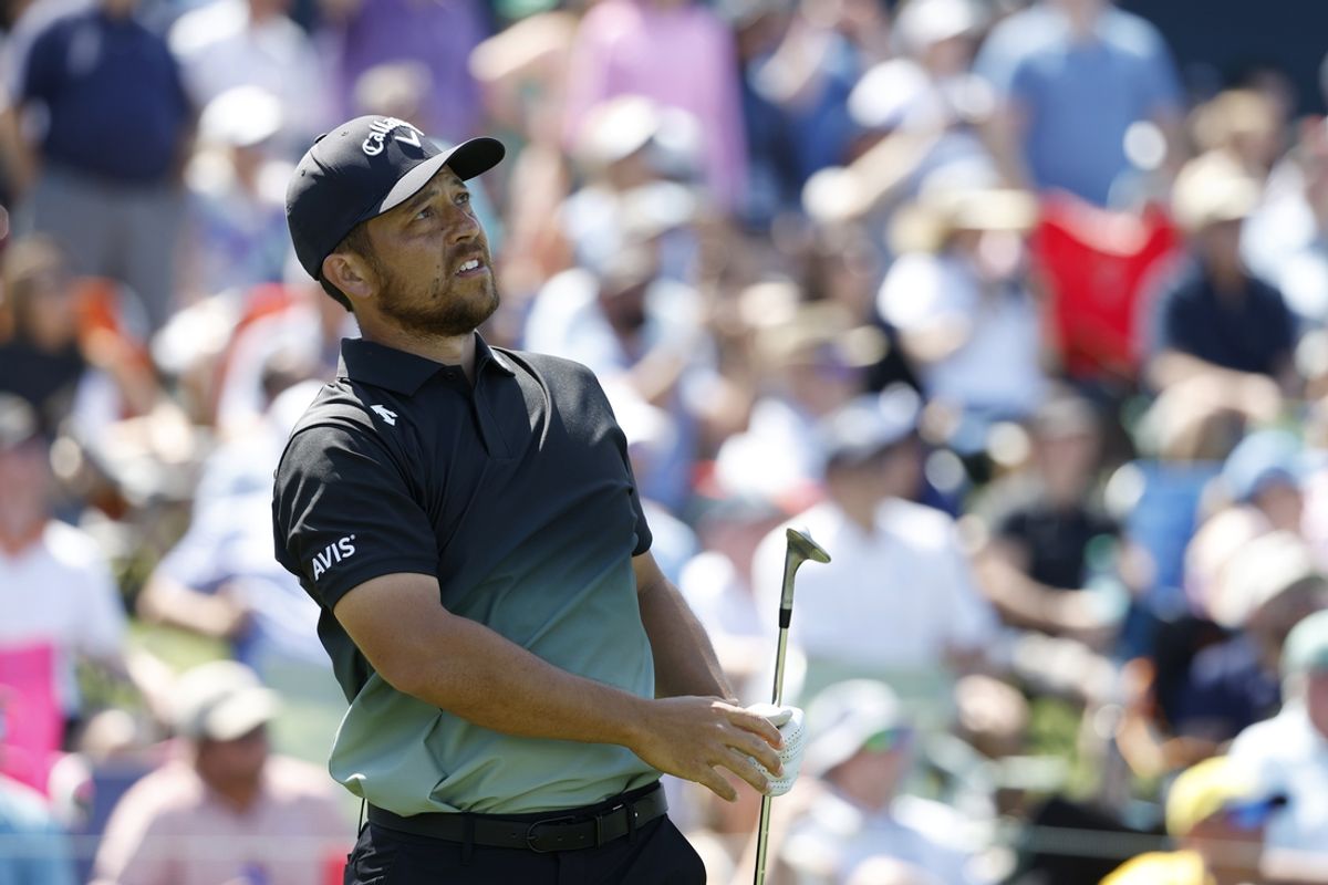 Mar 15, 2025; Ponte Vedra Beach, Florida, USA; Xander Schauffele hits from the seventeenth tee during the third round of The Players Championship golf tournament. Mandatory Credit: Jeff Swinger-Imagn Images