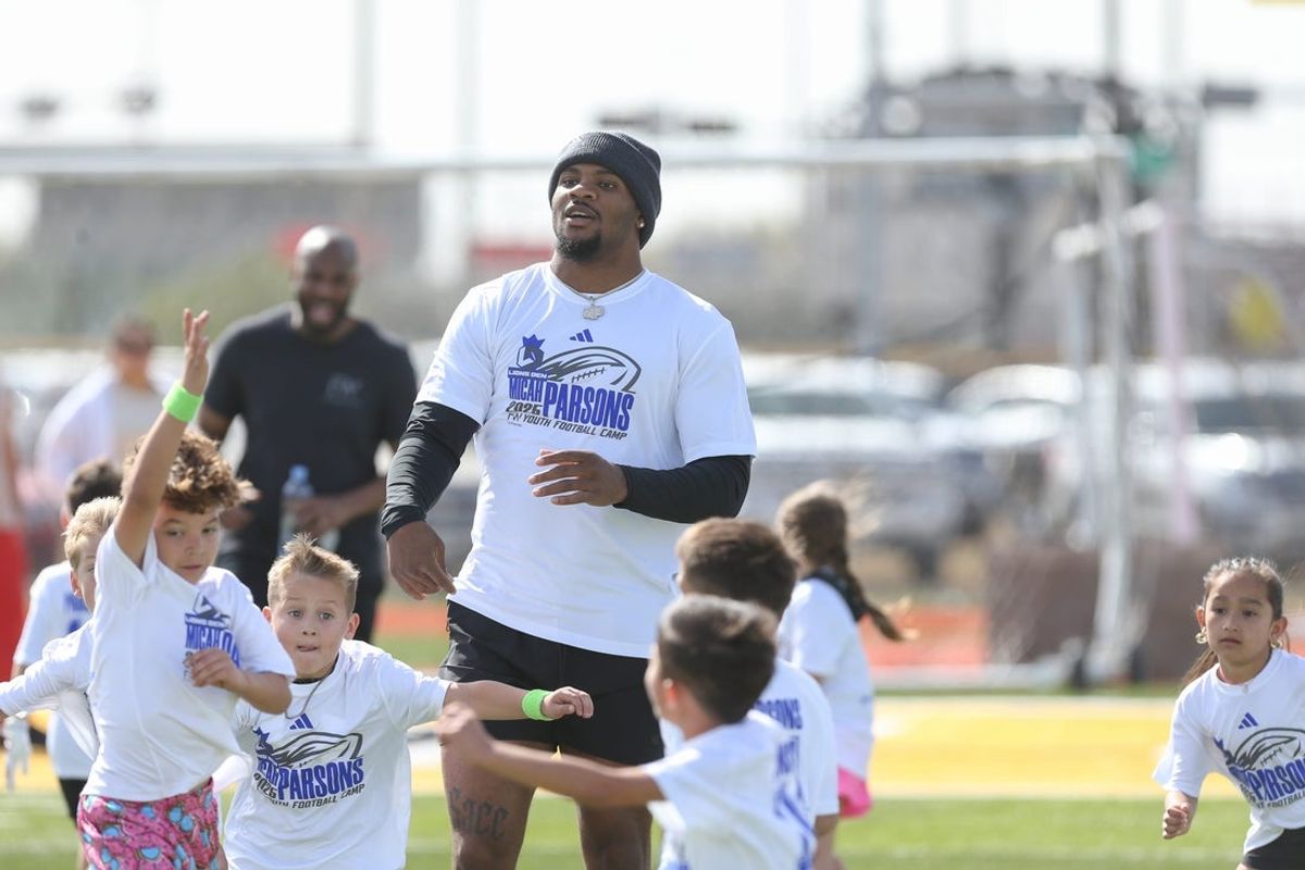 Dallas Cowboys linebacker Micah Parsons plays a scrimmage with campers at the Micah Parsons Lions Den Football Camp at St. John Paul II High School in Corpus Christi, Texas, on Saturday, March 15, 2025.
