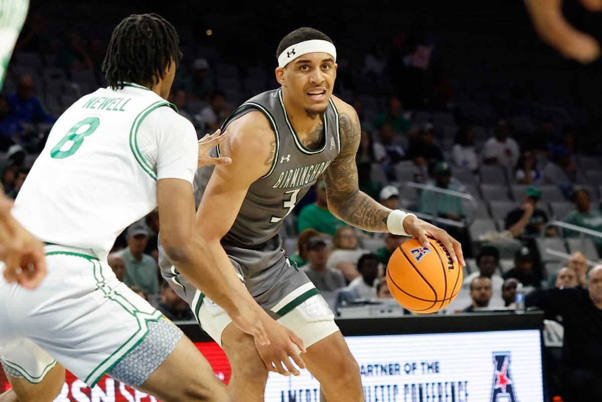 Mar 15, 2025; Fort Worth, TX, USA;  UAB Blazers forward Yaxel Lendeborg (3) controls the ball as North Texas Mean Green forward Grant Newell (8) defends during the first half at Dickies Arena. Mandatory Credit: Chris Jones-Imagn Images