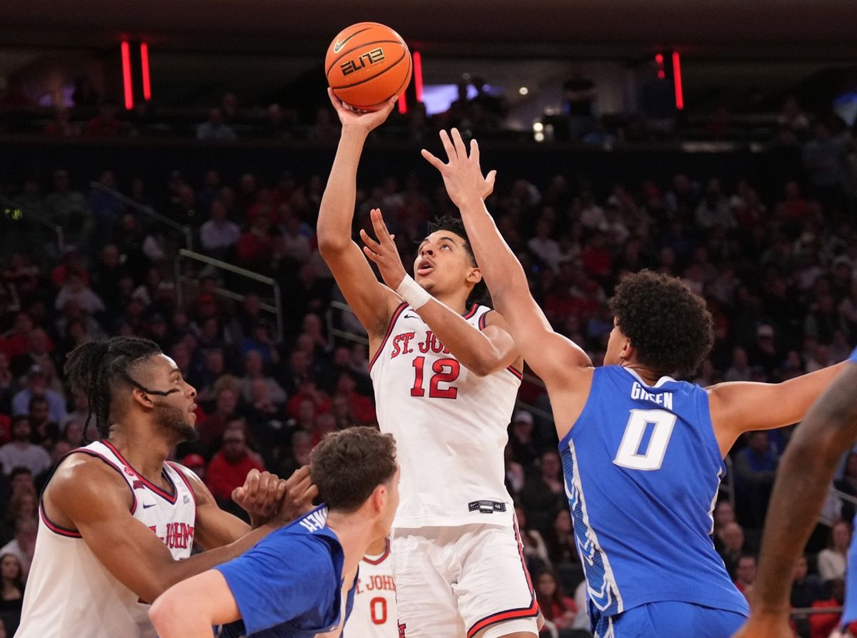 Mar 15, 2025; New York, NY, USA;  St. John's Red Storm guard RJ Luis Jr. (12) shoots against the Creighton Bluejays in the first half at Madison Square Garden. Mandatory Credit: Robert Deutsch-Imagn Images