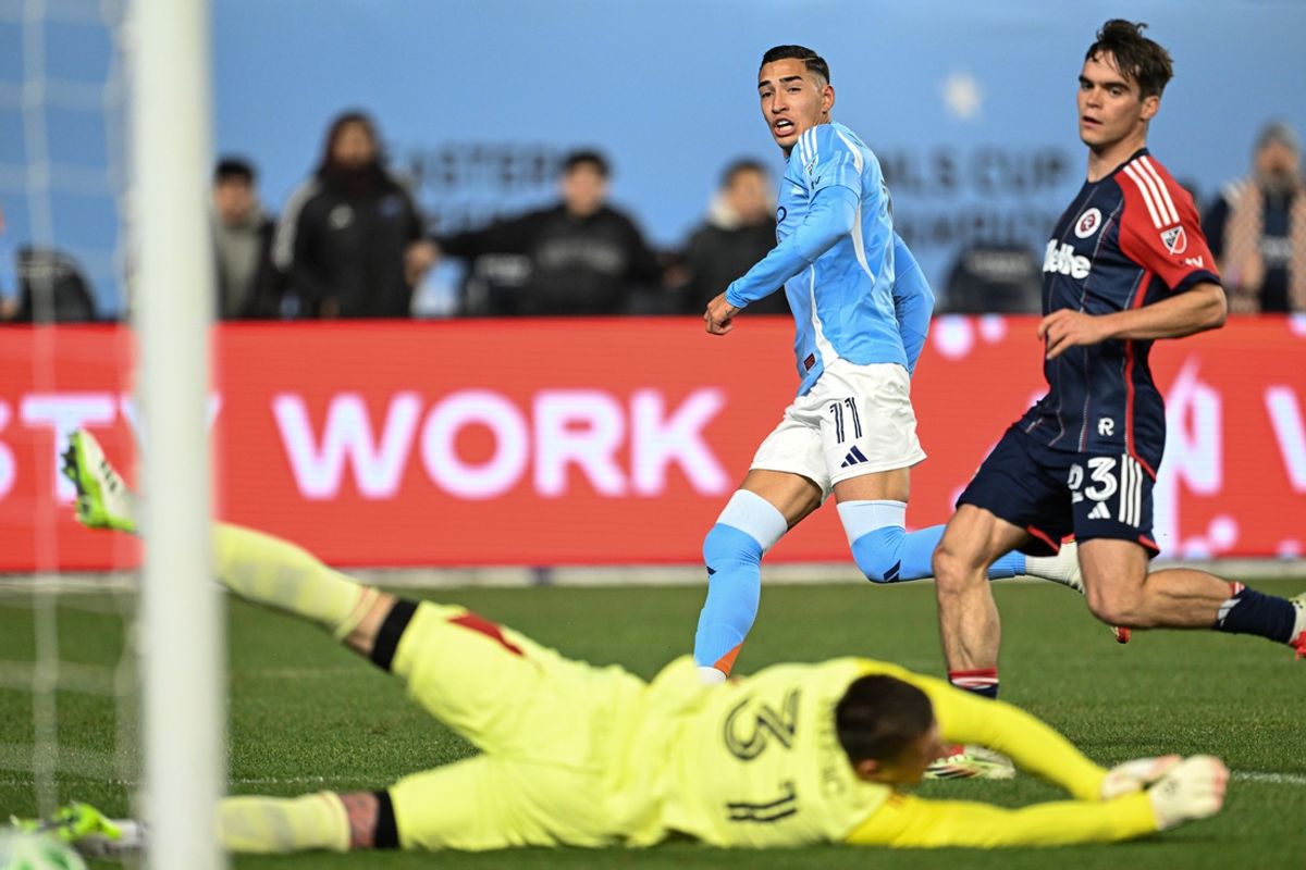 Mar 15, 2025; New York, New York, USA; New York City FC forward Julian Fernandez (11) watches his shot go in the goal past New England Revolution goalkeeper Aljaz Ivacic (31) during the first half at Yankee Stadium. Mandatory Credit: Mark Smith-Imagn Images
