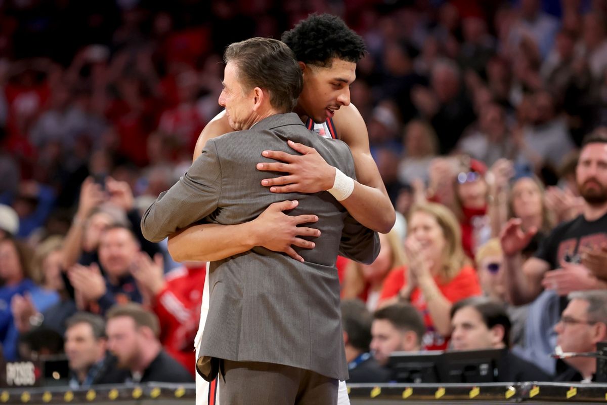 Mar 15, 2025; New York, NY, USA; St. John's Red Storm head coach Rick Pitino hugs guard RJ Luis Jr. (12) during the second half against the Creighton Bluejays at Madison Square Garden. Mandatory Credit: Brad Penner-Imagn Images