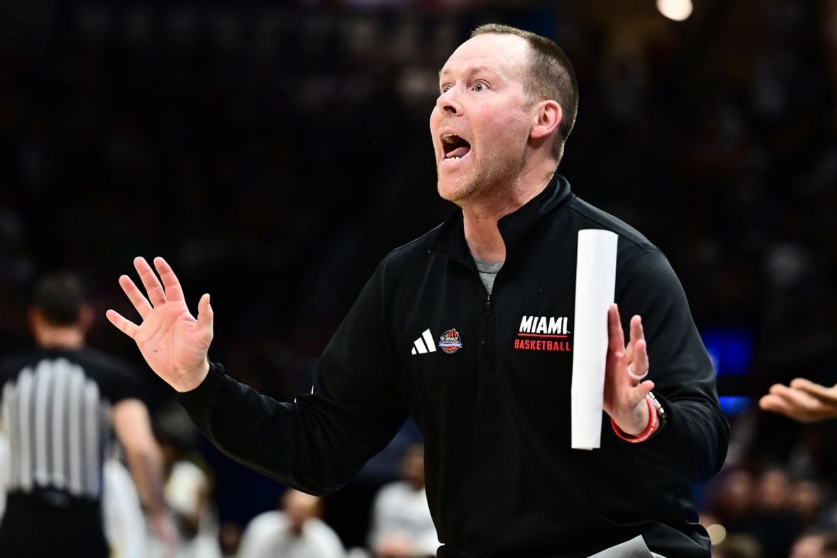 Mar 15, 2025; Cleveland, OH, USA;  Miami (Oh) Redhawks head coach Travis Steele reacts against the Akron Zips during the second half of the MAC Conference Tournament Championship game at Rocket Arena. Mandatory Credit: Ken Blaze-Imagn Images