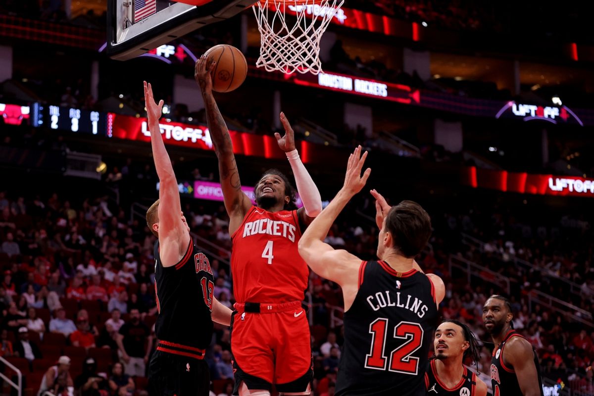 Mar 15, 2025; Houston, Texas, USA; Houston Rockets guard Jalen Green (4) shoots a layup against the Chicago Bulls during the fourth quarter at Toyota Center. Mandatory Credit: Erik Williams-Imagn Images