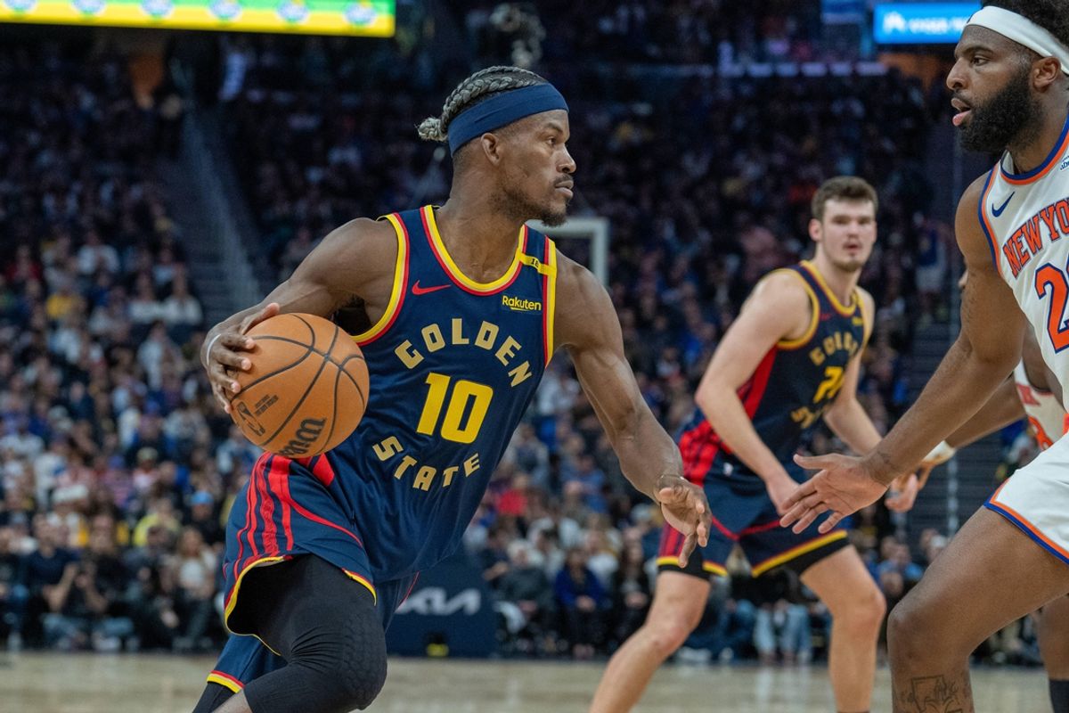 Mar 15, 2025; San Francisco, California, USA; Golden State Warriors forward Jimmy Butler III (10) drives to the net against the New York Knicks during the fourth quarter at Chase Center. Mandatory Credit: Neville E. Guard-Imagn Images