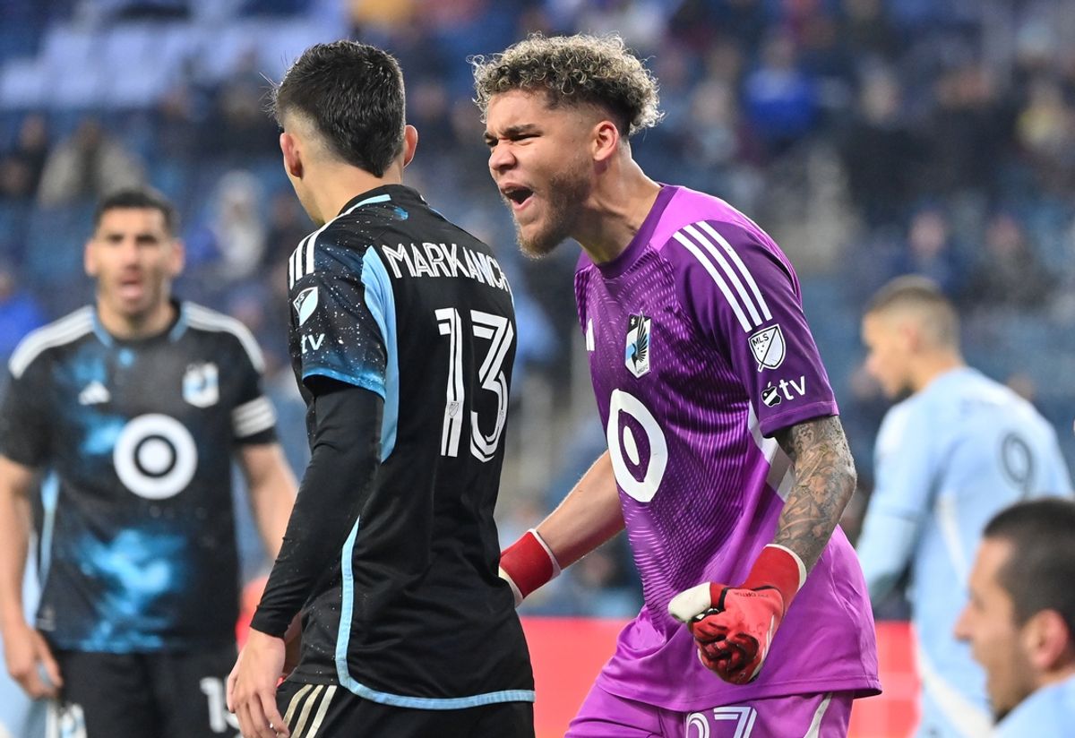 Mar 15, 2025; Kansas City, Kansas, USA;  Minnesota United goalkeeper Dayne St. Clair (97) reacts after a play with teammate Anthony Markanich (13) in the second half against Sporting Kansas City at Children's Mercy Park. Mandatory Credit: Peter Aiken-Imagn Images