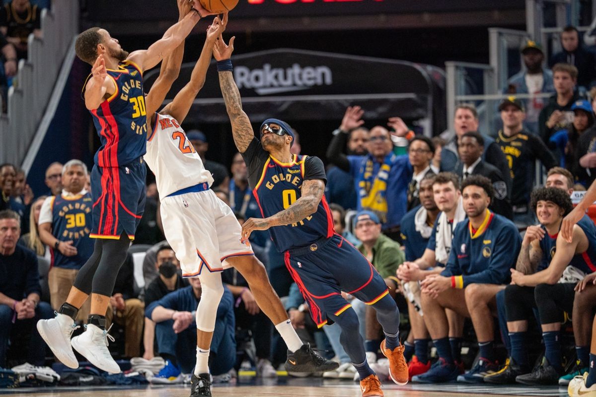 Mar 15, 2025; San Francisco, California, USA; Golden State Warriors guard Stephen Curry (30) and Golden State Warriors guard Gary Payton II (0) steal the basketball away from New York Knicks forward Mikal Bridges (25) on the throw in during the fourth quarter at Chase Center. Mandatory Credit: Neville E. Guard-Imagn Images