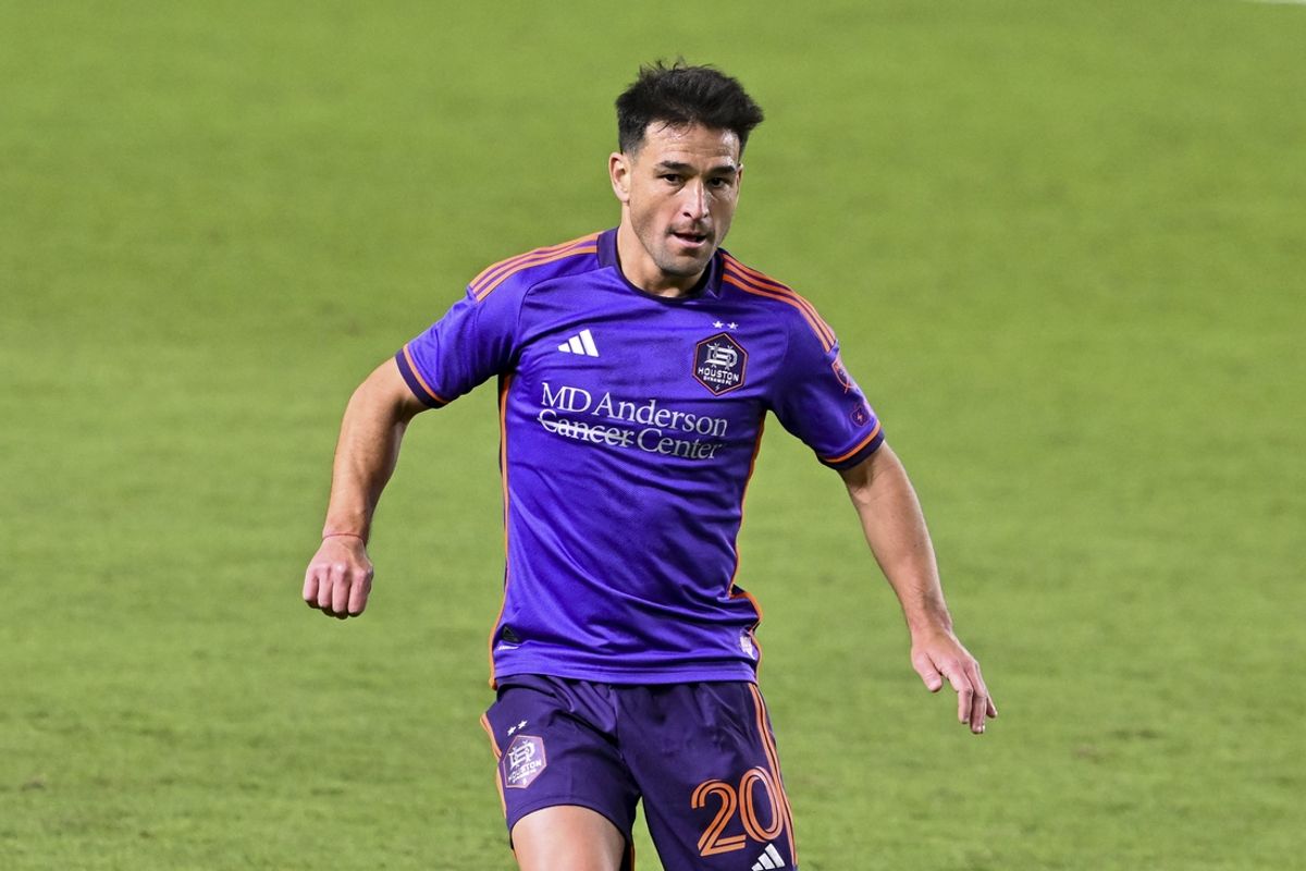 Mar 15, 2025; Houston, Texas, USA; Houston Dynamo midfielder Nicolas Lodeiro (20) in action during the second half against the Real Salt Lake at Shell Energy Stadium. Mandatory Credit: Maria Lysaker-Imagn Images