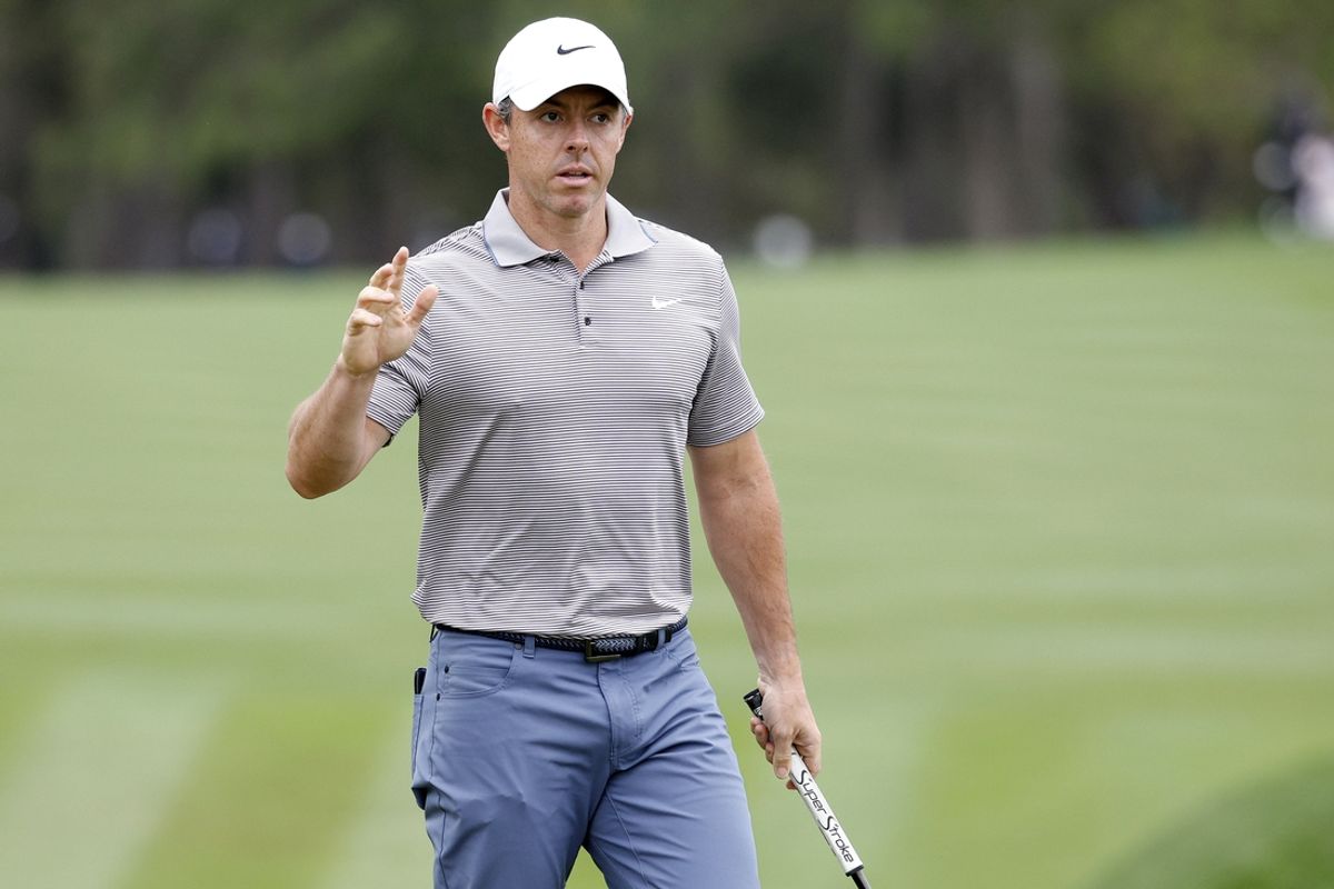 Mar 16, 2025; Ponte Vedra Beach, Florida, USA; Rory McIlroy reacts to his eagle putt on the second green during the final round of The Players Championship golf tournament at TPC Sawgrass. Mandatory Credit: Jeff Swinger-Imagn Images