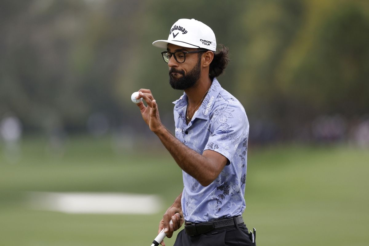 Mar 16, 2025; Ponte Vedra Beach, Florida, USA; Akshay Bhatia reacts after his putt on the second green during the final round of The Players Championship golf tournament at TPC Sawgrass. Mandatory Credit: Jeff Swinger-Imagn Images