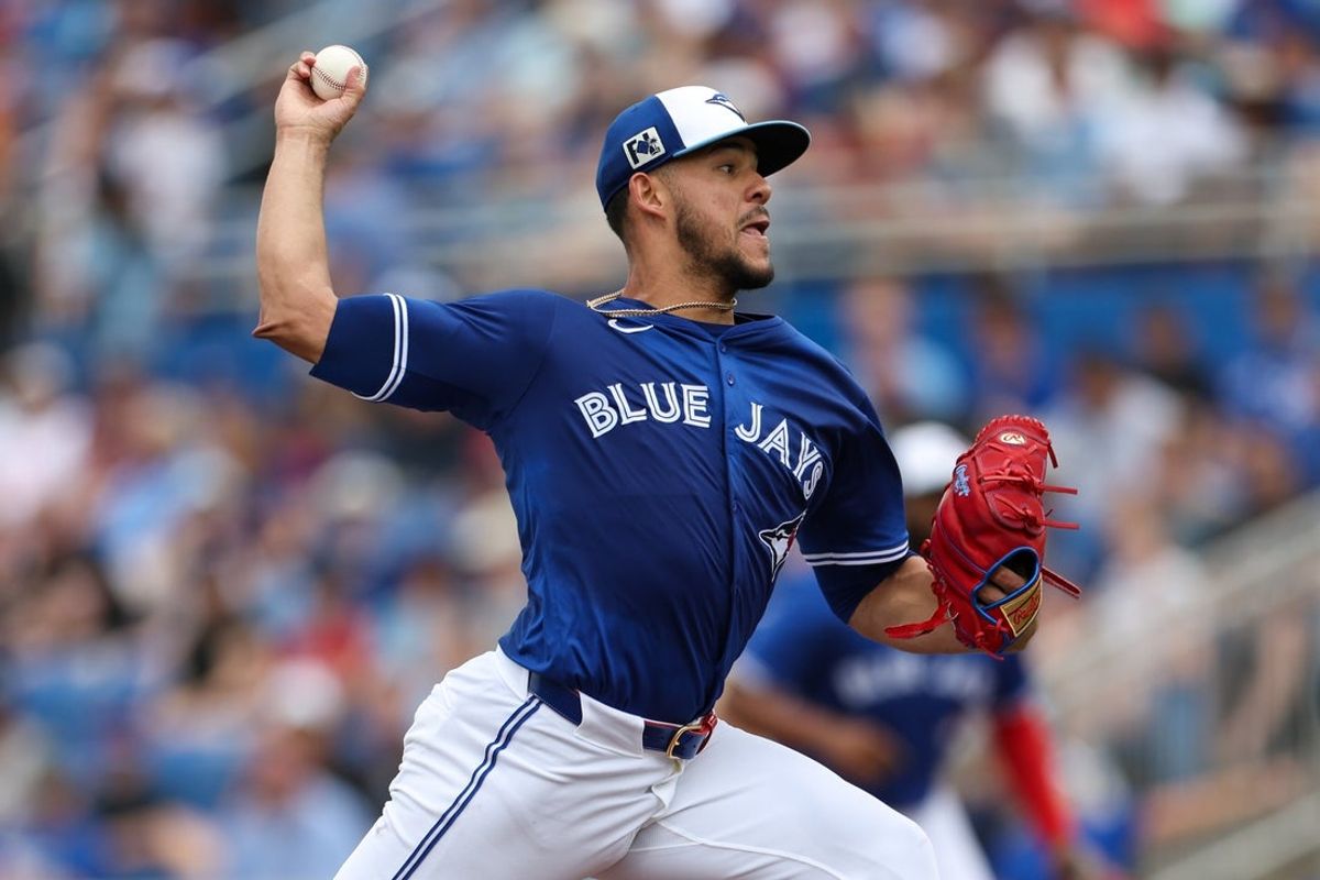 Mar 16, 2025; Dunedin, Florida, USA; Toronto Blue Jays pitcher Jose Berrios (17) throws a pitch against the Atlanta Braves in the first inning during spring training at TD Ballpark. Mandatory Credit: Nathan Ray Seebeck-Imagn Images