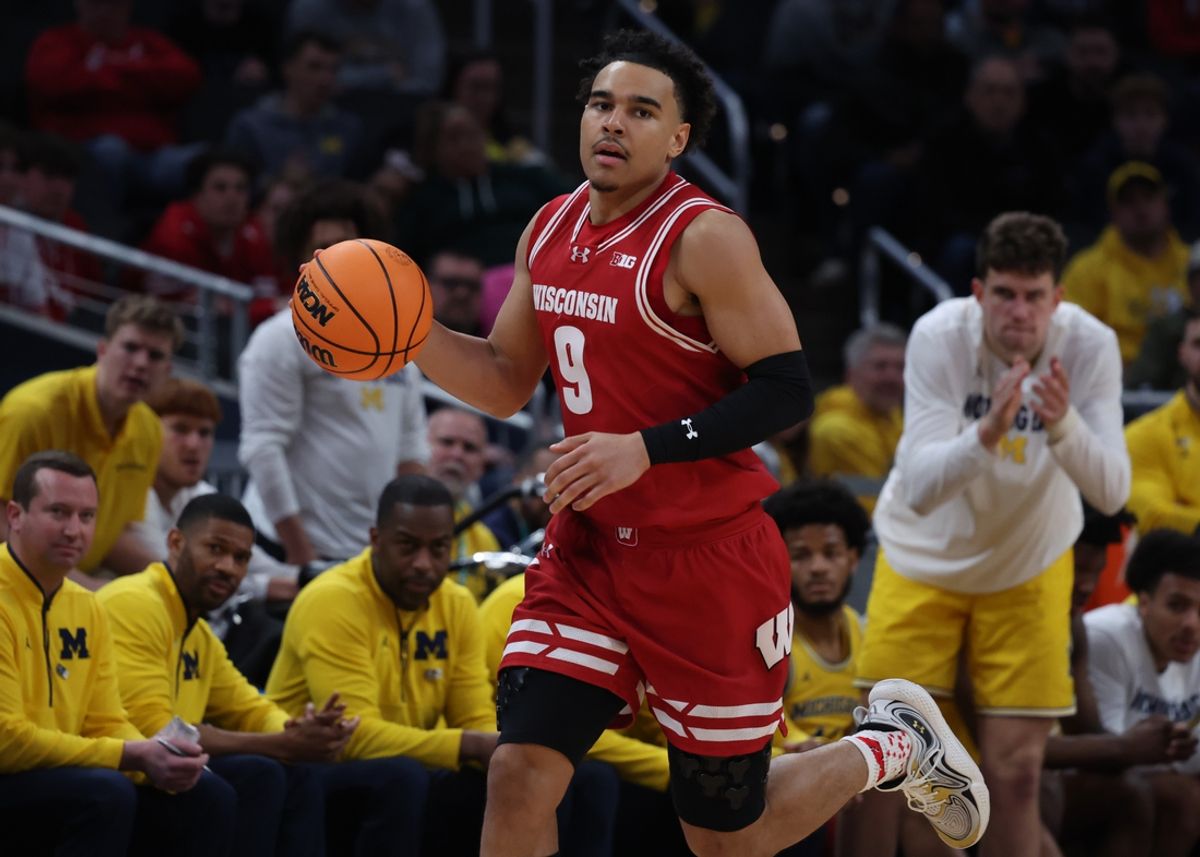 Wisconsin Badgers guard John Tonje (9) dribbles downcourt during the second half against the Michigan Wolverines during the 2025 Big Ten Championship Game at Gainbridge Fieldhouse. Mandatory Credit: Trevor Ruszkowski-Imagn Images