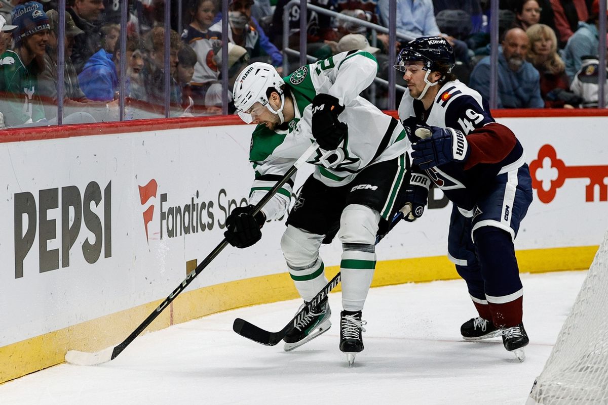 Mar 16, 2025; Denver, Colorado, USA; Dallas Stars center Mavrik Bourque (22) and Colorado Avalanche defenseman Samuel Girard (49) battle for the puck in the first period at Ball Arena. Mandatory Credit: Isaiah J. Downing-Imagn Images