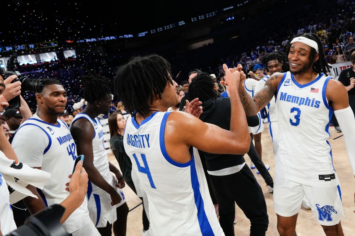 Mar 16, 2025; Fort Worth, TX, USA;  The Memphis Tigers basketball team reacts after defeating the UAB Blazers for the American Athletic Conference Championship at Dickies Arena.  Mandatory Credit: Chris Jones-Imagn Images