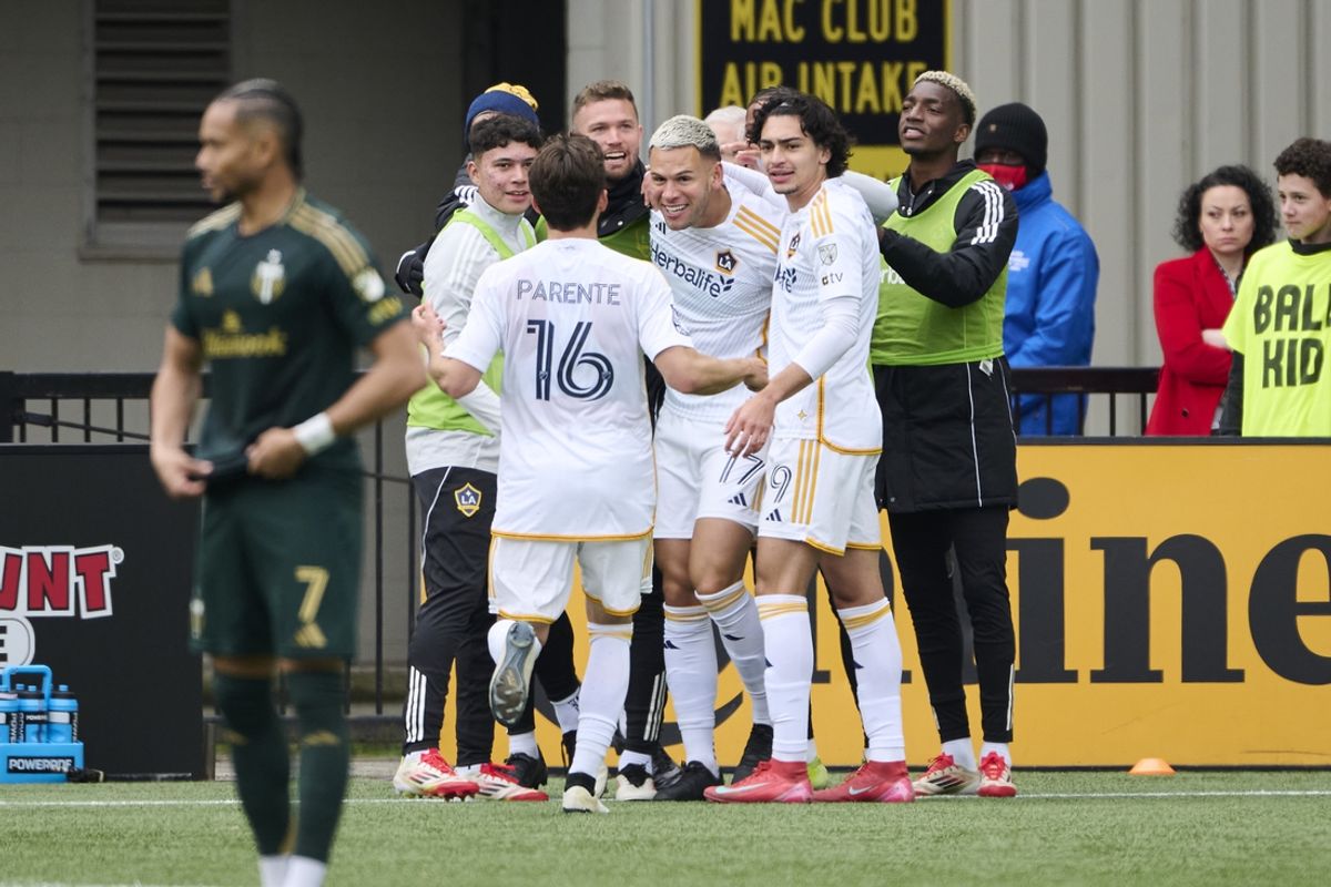 Mar 16, 2025; Portland, Oregon, USA; Los Angeles Galaxy forward Christian Ramirez (17) celebrates with teammates after scoring a goal during the second half against the Portland Timbers at Providence Park. Mandatory Credit: Troy Wayrynen-Imagn Images