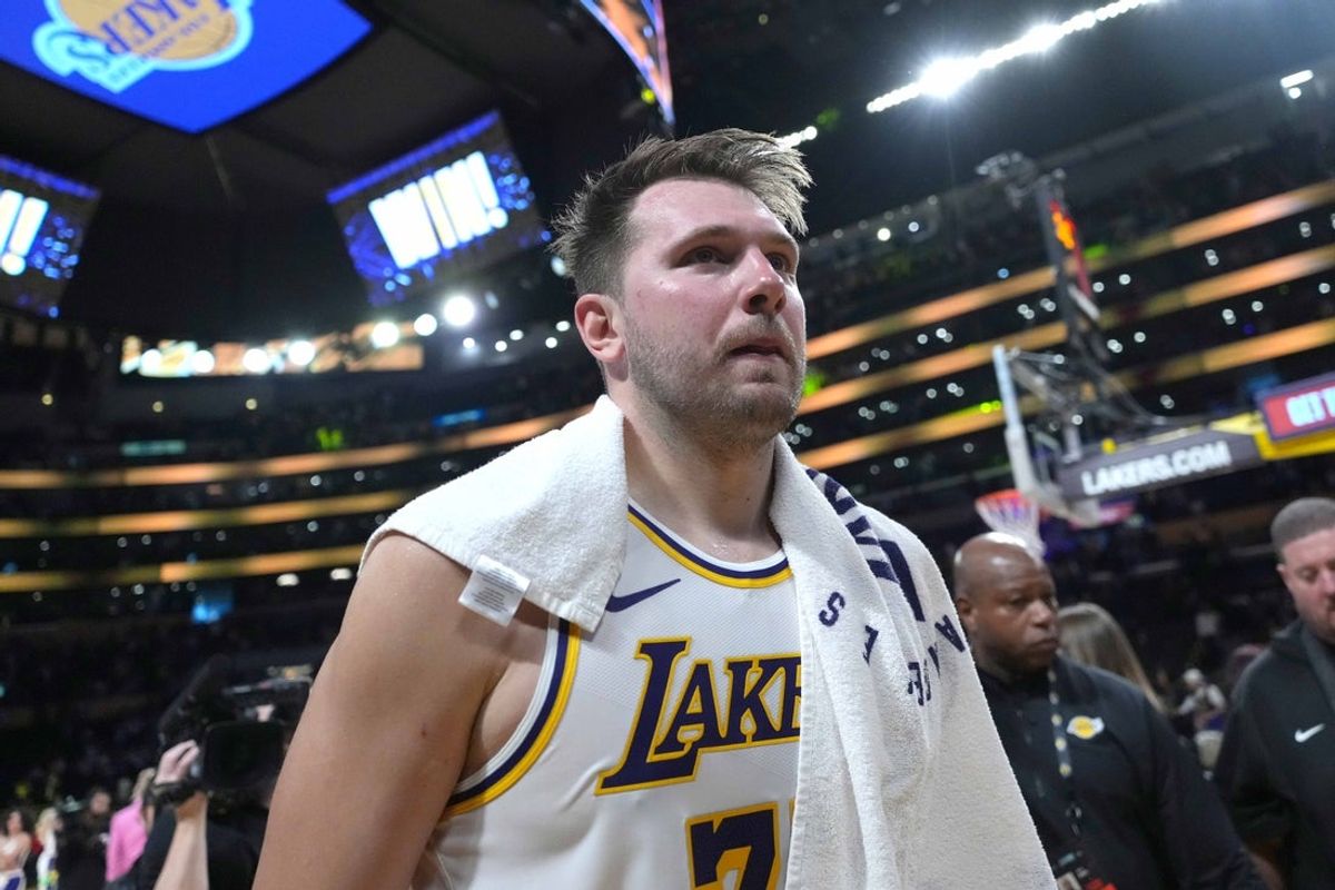 Mar 16, 2025; Los Angeles, California, USA; Los Angeles Lakers guard Luka Doncic (77) reacts after the game against the Phoenix Suns at Crypto.com Arena. Mandatory Credit: Kirby Lee-Imagn Images