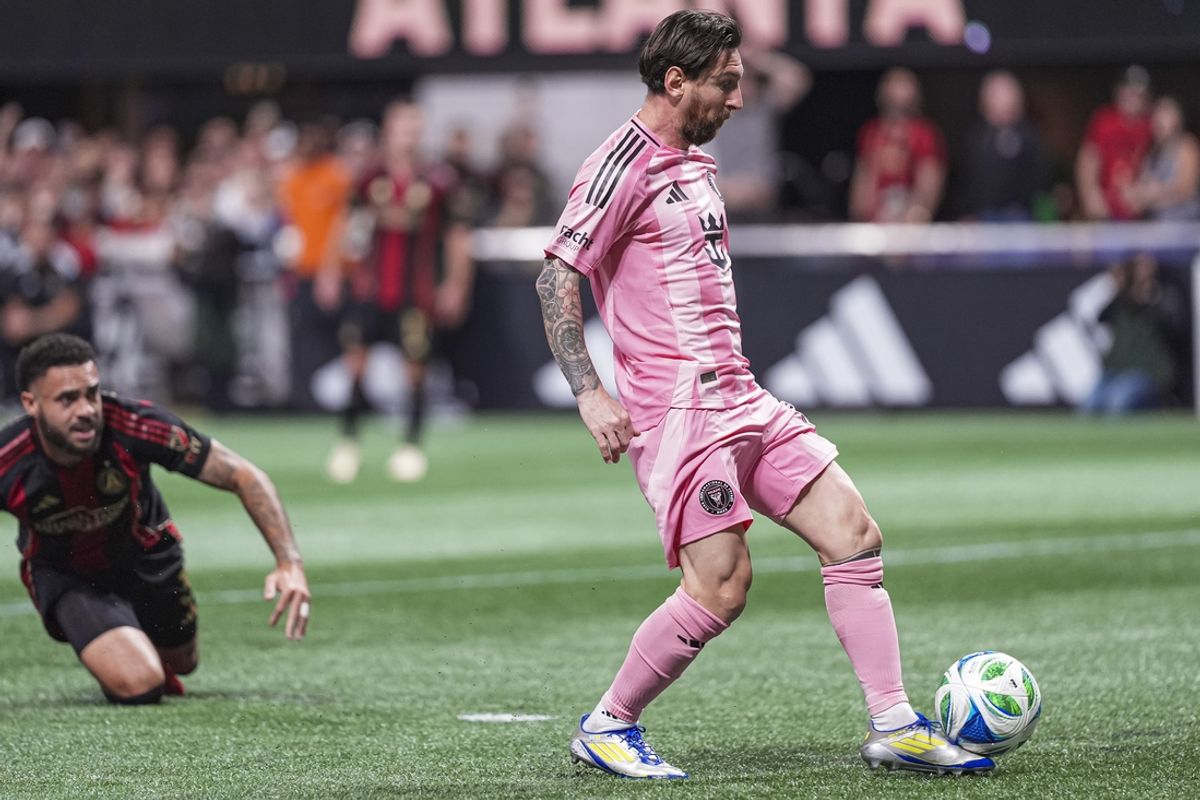 Mar 16, 2025; Atlanta, Georgia, USA; Inter Miami forward Lionel Messi (10) gets behind Atlanta United defender Derrick Williams (3) to score a goal during the first half at Mercedes-Benz Stadium. Mandatory Credit: Dale Zanine-Imagn Images