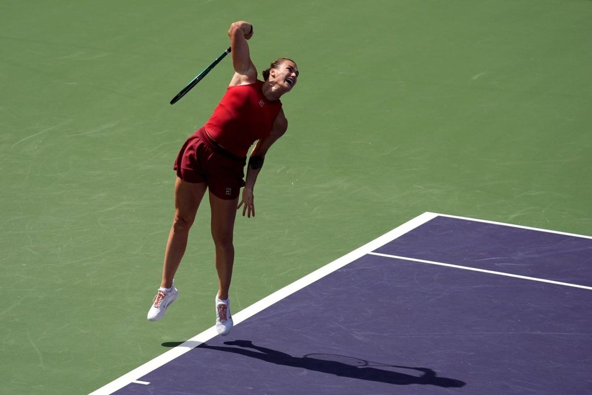 Aryna Sabalenka serves to Mirra Andreeva during the women's championship match of the BNP Paribas Open at the Indian Wells Tennis Garden in Indian Wells, Calif., on Sunday, March 16, 2025.